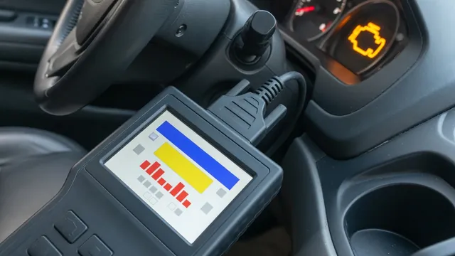 OBD-II scan tool plugged into a car's diagnostic port, with the check engine light on in the background