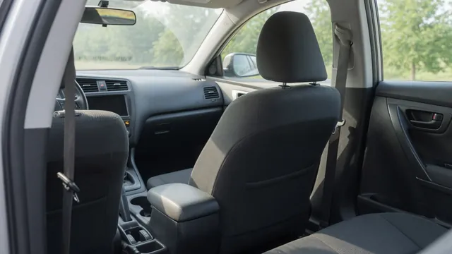 Passenger seat and dashboard airbag status indicator illustrating an occupant detection system concern.