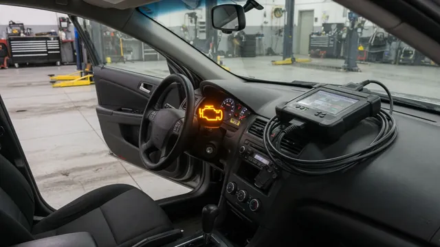 Diagnostic scanner beside a vehicle dashboard with an illuminated check engine light