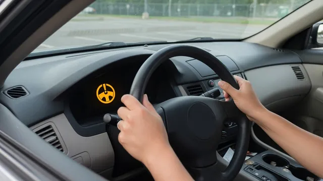 Dashboard steering warning light with a driver's hands on the steering wheel in a parked car