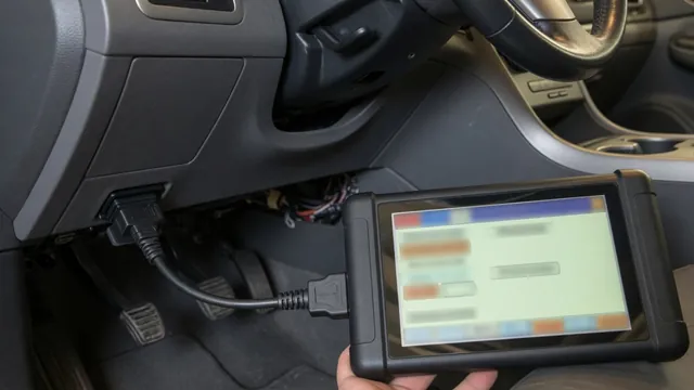 OBD-II scan tool connected to a car's diagnostic port, used to read a manufacturer-specific P1203 trouble code