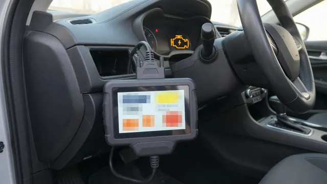 OBD-II scan tool connected under a car dashboard to read a P1358 trouble code with the check engine light on