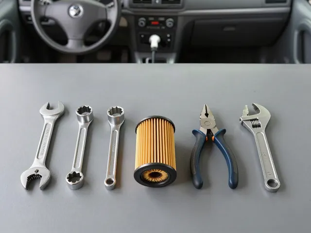 Five types of oil filter wrenches arranged on a bench around a spin-on oil filter