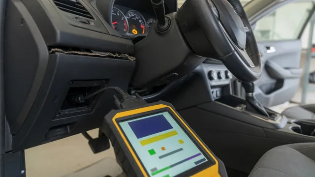 OBD-II scan tool plugged into a car diagnostic port, reading a manufacturer-specific trouble code