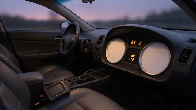 Car dashboard showing illuminated ABS and traction control warning lights next to a diagnostic scan tool