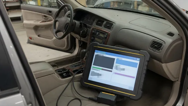 Diagnostic scan tool beside a vehicle dashboard showing the P1915 trouble code