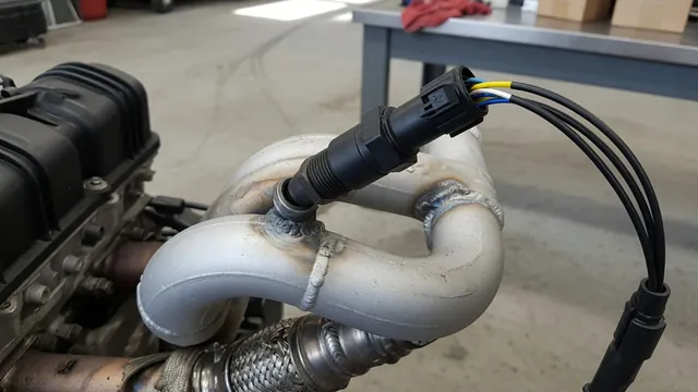 Upstream oxygen sensor and heater wiring on an illustrative Bank 2 exhaust manifold
