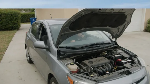 Honda parked with its hood open while the driver records dashboard warning lights and starting symptoms.