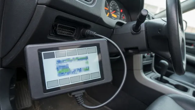 OBD-II scanner connected to a car's diagnostic port reading a trouble code while the check engine light is on