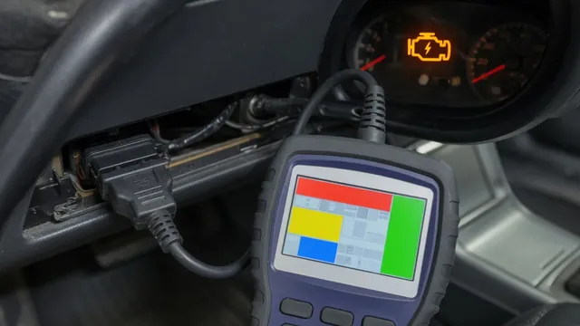 OBD-II scan tool connected under a car dashboard with the check engine light on in the background
