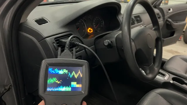 OBD-II scan tool connected under a car dashboard showing a trouble code, with the check engine light on