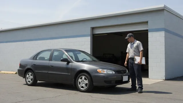 Nissan Rogue parked outside an automotive service bay for a transmission inspection