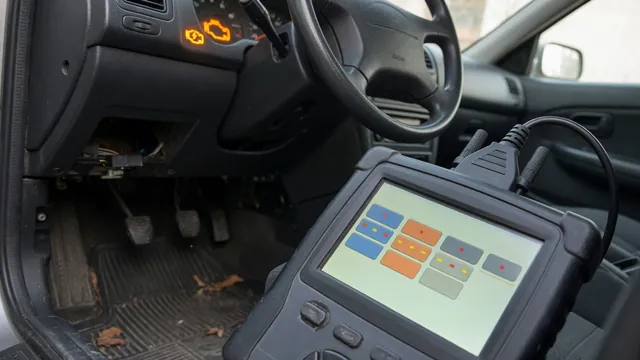 OBD-II scan tool plugged into a car's diagnostic port with the check engine light on