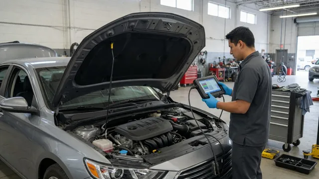 Technician reviewing coolant temperature sensor data on a scan tool beside a parked vehicle