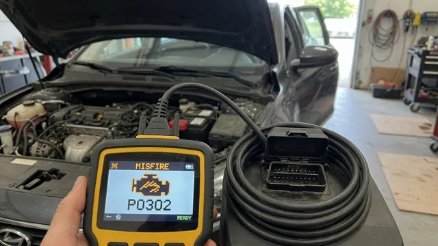 OBD-II scan tool displaying a P0300 random misfire code with a car engine bay in the background