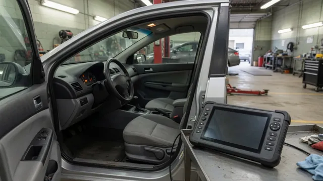 Diagnostic scan tool beside a vehicle dashboard displaying a chassis system warning light