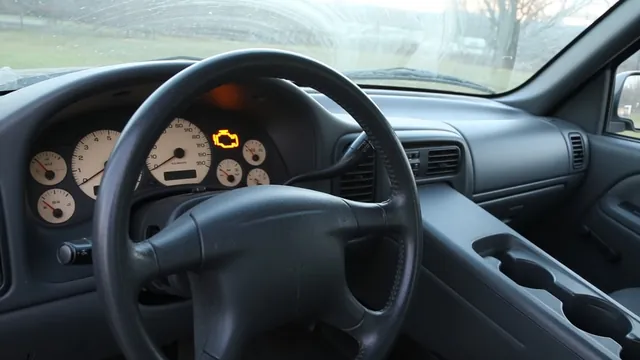 Ford Ranger dashboard with an illuminated check engine symbol while the truck is parked