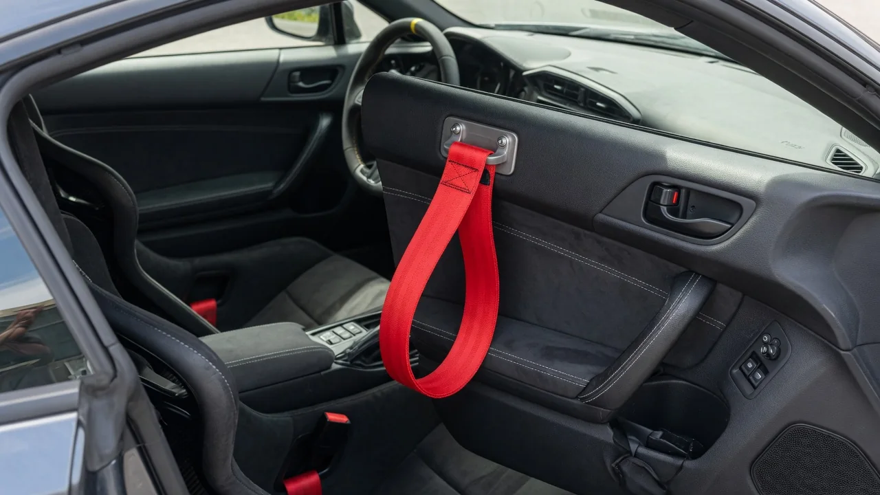 Why Do Some Cars Have Door-Pull Loops Instead of Handles?