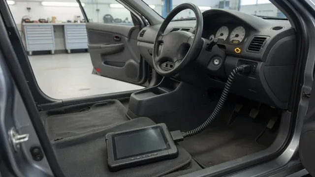 Diagnostic scanner connected beneath a vehicle dashboard with a check engine light illuminated