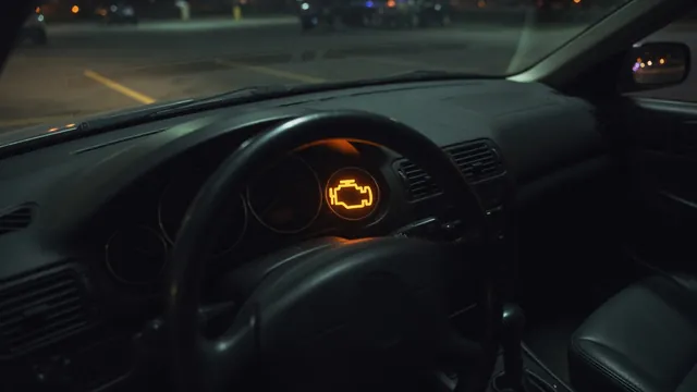 Illuminated check engine symbol on the dashboard of a safely parked vehicle