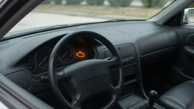 Illustration of a Hyundai Elantra dashboard with an illuminated amber check engine symbol