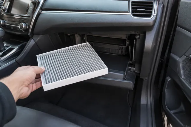 Honda Civic glove compartment area with a cabin air filter ready for installation