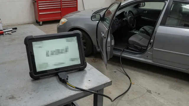 Diagnostic scanner beside a vehicle dashboard displaying the P1236 trouble code