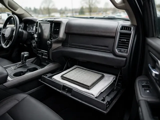 Ram truck glove box open for a cabin air filter inspection