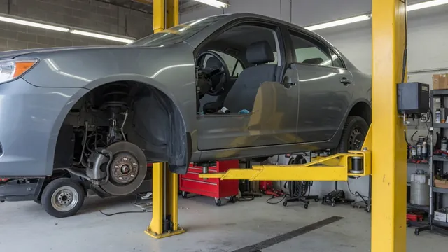Honda Civic front wheel area with the wheel removed for a professional bearing inspection