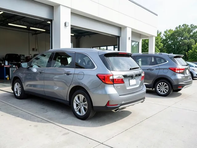 Honda Pilot, Passport and Ridgeline parked outside an automotive service garage