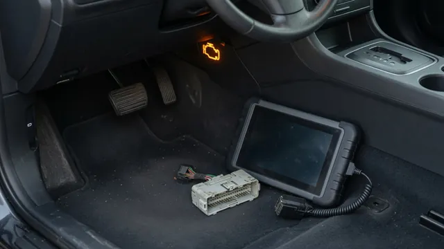 Dashboard warning light and diagnostic scanner beside a stationary vehicle’s accelerator pedal