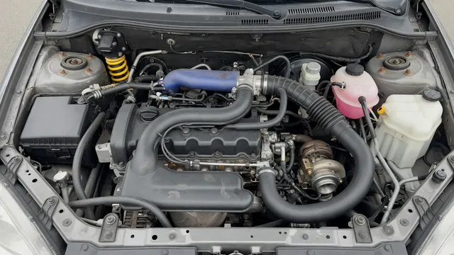 Illustration of the valve cover and crankcase ventilation routing on a GM 1.4 turbo engine