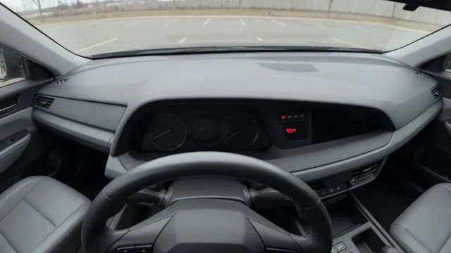 Volkswagen dashboard showing an oil pressure warning with the vehicle safely parked and engine switched off