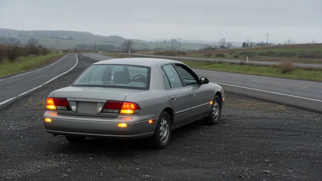 Car parked in a roadside turnout with hazard lights on and its hood closed while the engine cools