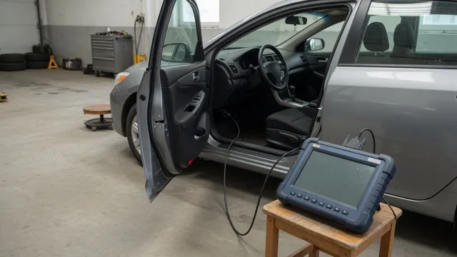 Diagnostic scanner beside a vehicle dashboard displaying the P1633 trouble code