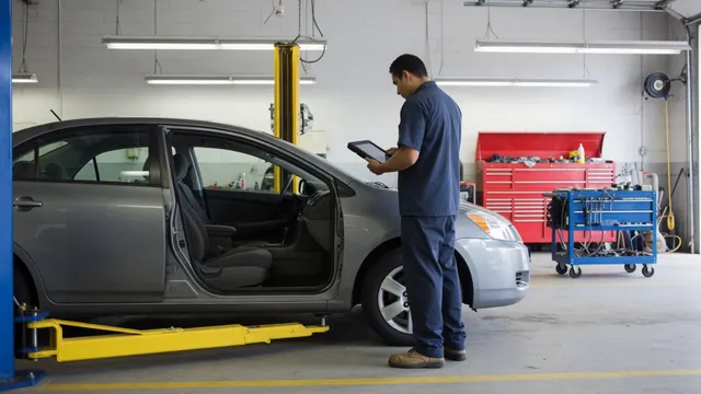 Nissan Altima parked in a service bay for a transmission inspection