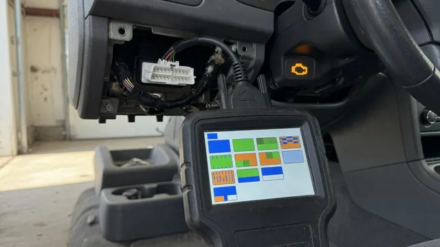 OBD-II scan tool plugged into a car's diagnostic port with the check engine light on in the background