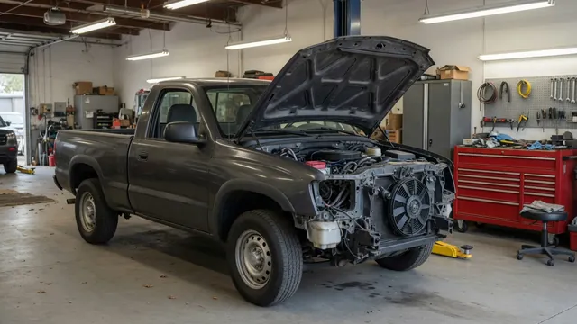 Ram 1500 with its hood open for a throttle body and sensor inspection