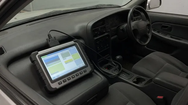 Diagnostic scan tool beside a vehicle dashboard displaying the P1425 trouble code.