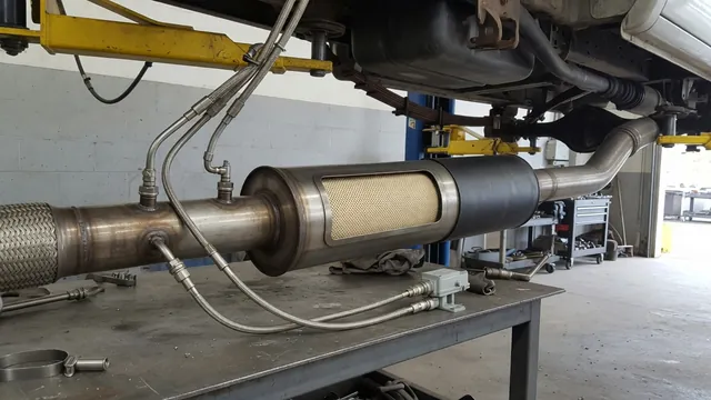 Diesel exhaust system illustration showing a particulate filter and nearby sensors