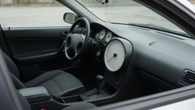 Dashboard tachometer showing engine speed at idle while the vehicle is parked