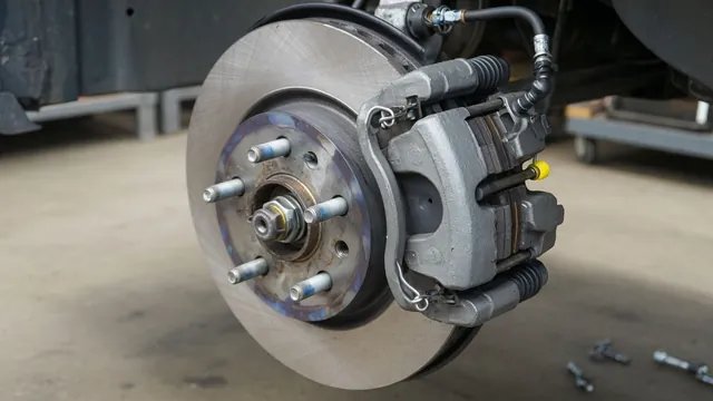 Illustrated brake assembly showing the rotor, pads, caliper, and retaining hardware