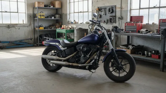 Harley-Davidson motorcycle with the fuel tank installed in a clean service workshop