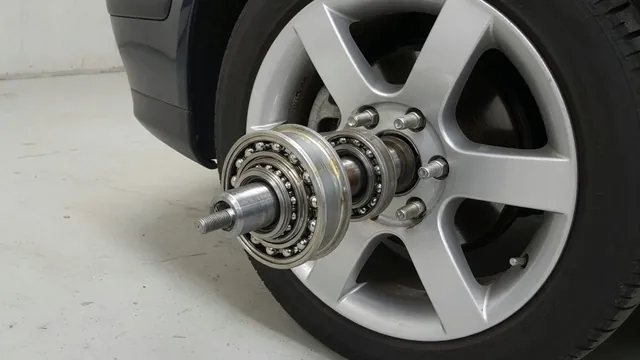 Illustration of a Mazda 3 front wheel hub and bearing within the wheel assembly