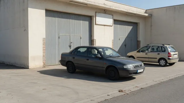 Jeep Patriot and Compass parked outside an automotive transmission service shop