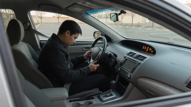 Driver observing dashboard lights while a parked car fails to start