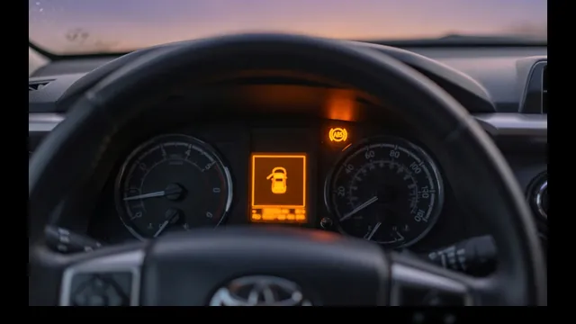 Dashboard with the ABS warning light and a stability control service message lit together