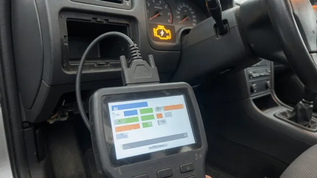 OBD-II scan tool plugged into a car's diagnostic port reading a trouble code while the check engine light is on