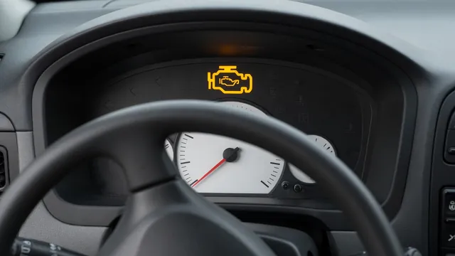 Illuminated check engine symbol on a dashboard with the vehicle parked