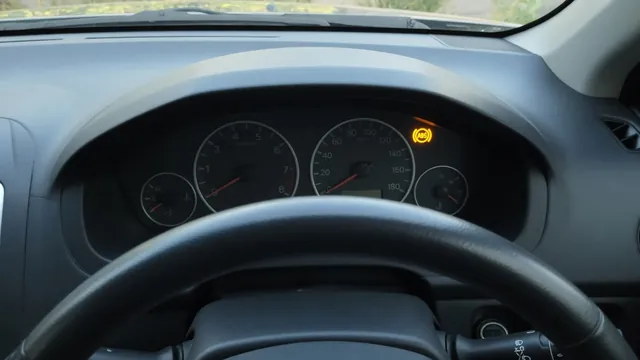 Illustration of an amber ABS warning light on a Volkswagen dashboard